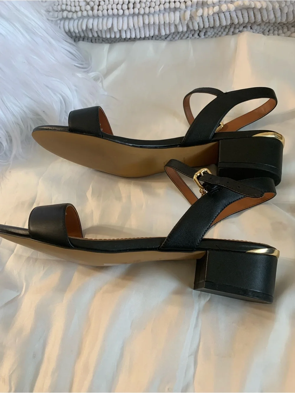 NWOT. Coach smooth leather, black sandals. Gold hardware.